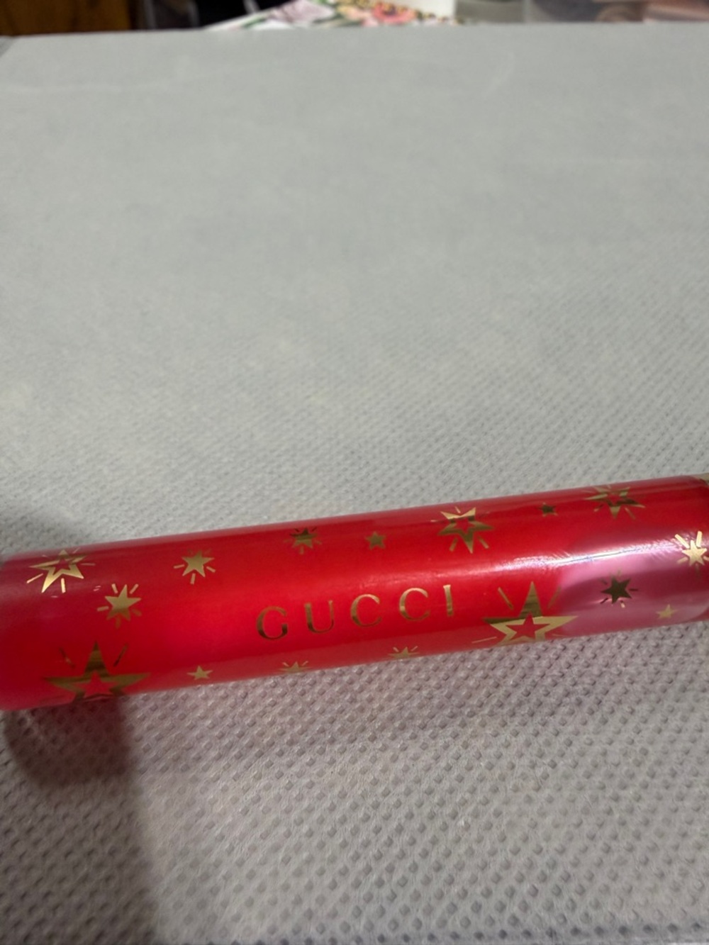 Gucci Red Lip Gloss with Gold Star Accents
